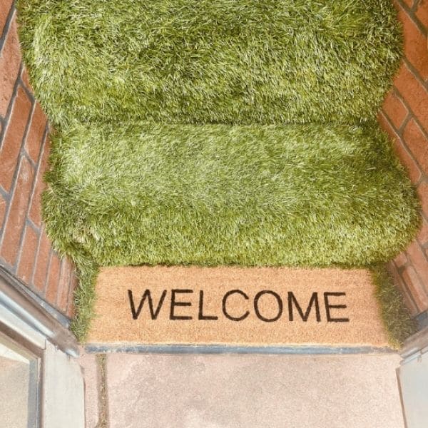 artificial grass on skoolie stairs
