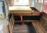 Bedroom area - Upper bunk for kids or animals, or storage. Bed comes up. I used the tie down straps and upper bunk to raise bed and access storage. The entire area under bed is storage.