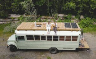 Full length roof deck and 2 solar panels. Rear deck is used to hold a motorcycle. 8 window bus is the perfect length for living and maneuverability!
