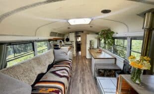 very spacious, fold out couch with ample storage, mini wood stove, prep table, berkey water filter and full size efficient fridge